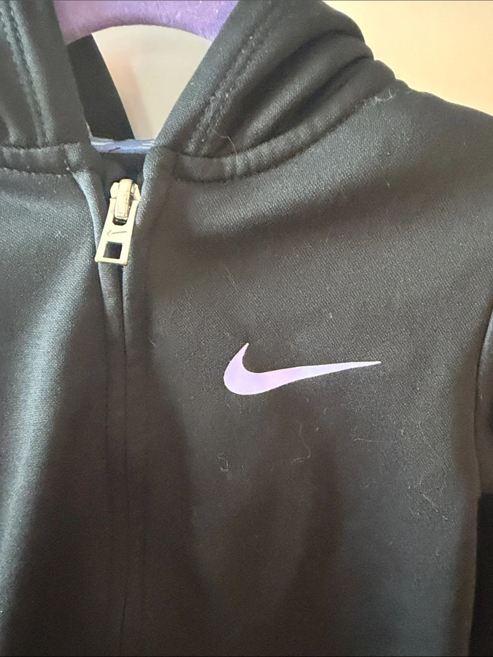 Nike Black Hoodie with Purple Swoosh and Blue/Purple Ruffle along the Bottom
